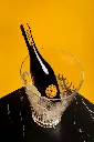 Grand Cuvée Botanique Blanc et Noir Sparkling 740 ml – bottle in a yellow setting