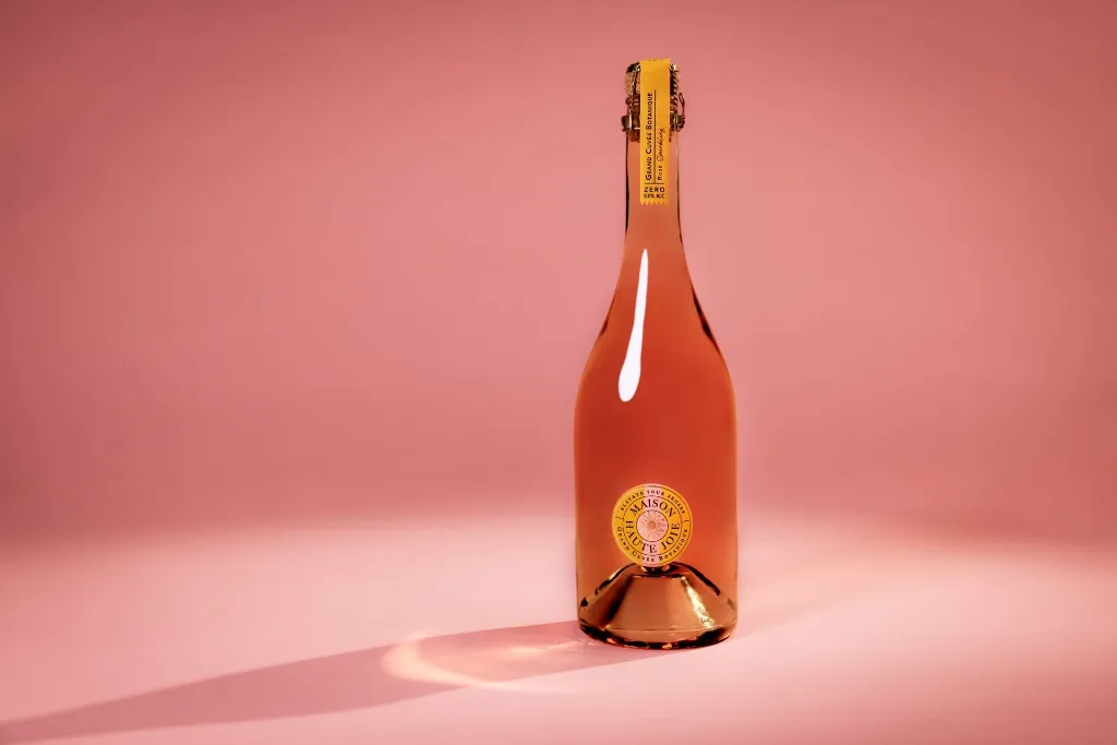 Grand Cuvée Botanique Rosé Sparkling 740 ml – bottle in an elegant tablescape